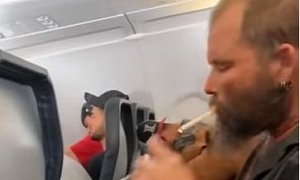 Confused Dude Lights a Cigarette on Spirit Airlines Flight