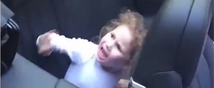 Little girl "getting eaten" by a convertible