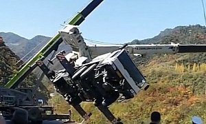 Crane Falls Over Down The Hillside, Driver Makes Last-Minute Escape
