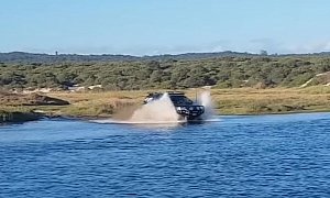 “Crazy Australians” Wow Tourists by Crossing a Creek in Their Toyota Hilux