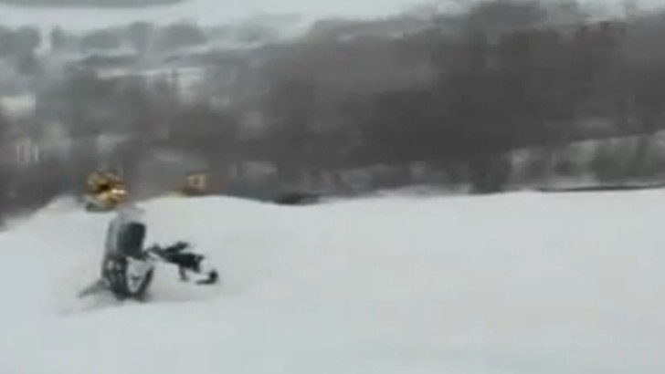 Crazy Double Snowmobile Crash for One Very Stupid Rider