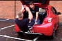 Crazy Gym Exercises You Can Do With a Peugeot 208 GTi