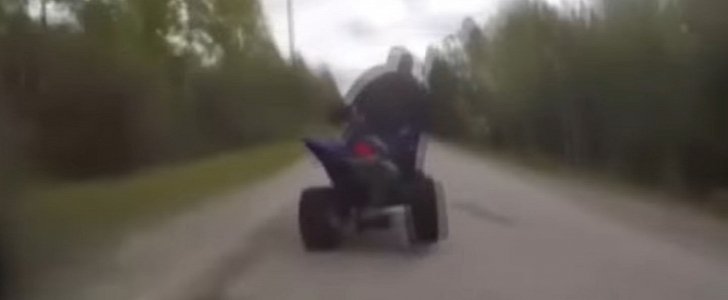 Insane quad bike rider rams police motorcycle
