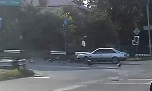 Crazy Russian Driver Crashes Hard into Biker