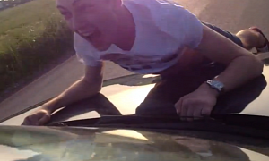Crazy Teen Rides on Hood of Car Going 150 KM/H