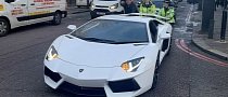 Crowd Laughs as Policewomen Push Lamborghini After Breaking Down Outside Harrods