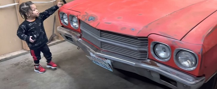 Two-Year-Old Pointing at Dad's Chevelle
