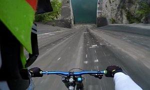 Cyclist Goes Down a Near-Vertical Dam Wall Because You (We All) Want Him to