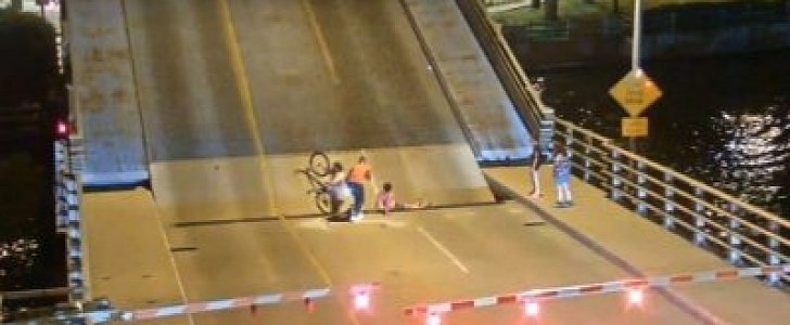 Female cyclist falls into bridge gap after ignoring barriers and flashing lights