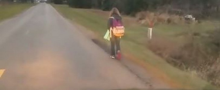 Dad drives behind daughter as she's made to walk to school after she got kicked off the school bus for bullying