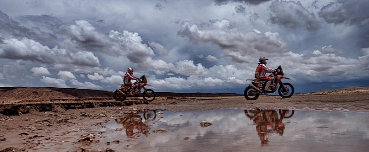 KTM riders near a pond, 2015 Dakar