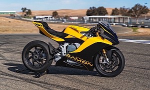 Damon HyperSport With New Battery Pack Test Battles Mystery 1,000cc Bike on the Track