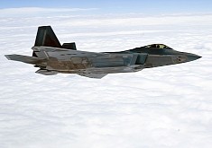 Deadly F-22 Raptor Looks All Peaceful Flying Over a Blanket of Fluffy Clouds