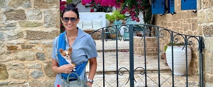 Demi Moore vacationing with her dog