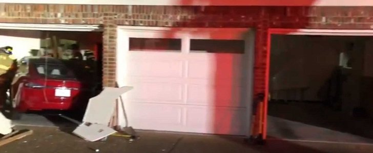 Tesla Model S with a mind of its own crashes into garage, with the driver still at the wheel