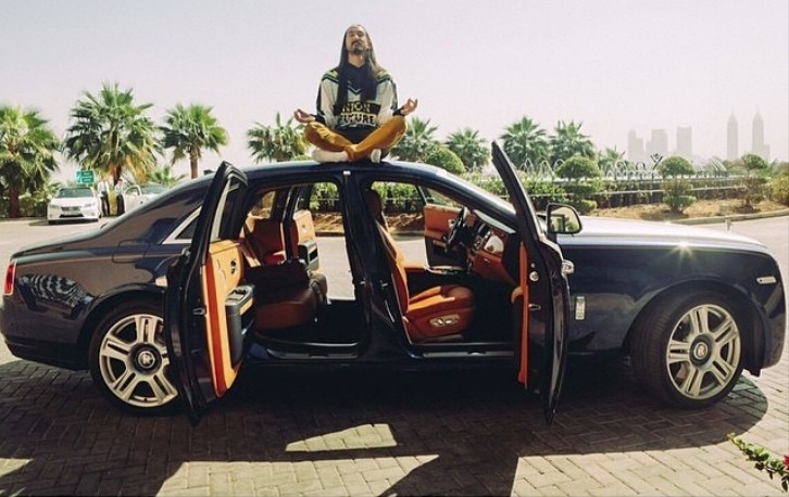 DJ Steve Aoki Uses the Top of a Rolls-Royce Ghost Series II to Meditate after a Concert