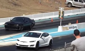Dodge Challenger Hellcat Blows Driveshaft to Pieces While Drag Racing a Tesla
