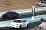 Dodge Challenger Hellcat Blows Driveshaft to Pieces While Drag Racing a Tesla