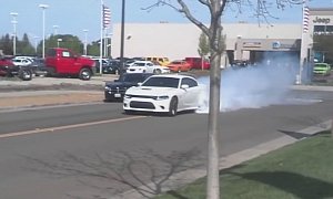 Dodge Charger Hellcat Does 1/8 Mile Burnout Right in Front of the Dealership