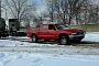 Dodge Dakota Pickup Pulls Semi Truck Stuck in Snow