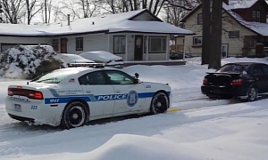 Dodge Police Car Pulled Out of Snow by Subaru WRX