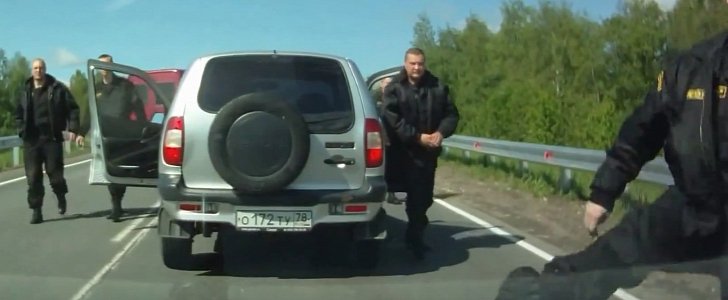 Russian SOBR kicking a car