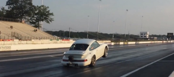 Porsche 911 doing wheel stand