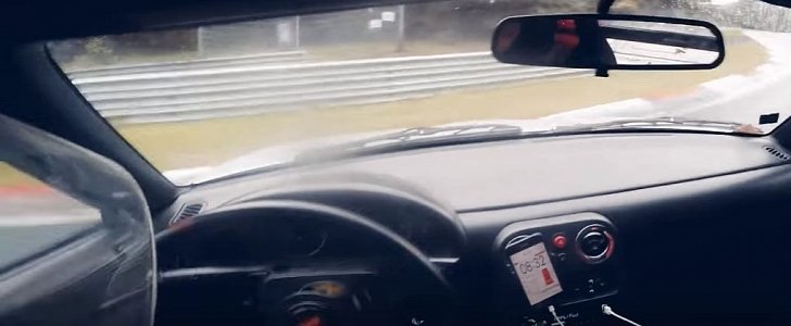 Drifting Mazda Miata Spins on Wet Nurburgring