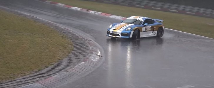 Drifting Porsche Cayman GT4 Spins on Soaking Wet Nurburgring