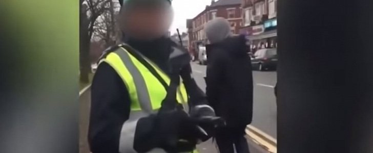 Driver confronts traffic warden handing out fines for being illegally parked himself