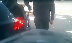 Driver Nearly Runs Cyclist over, then Pulls a Baseball Bat from the Trunk