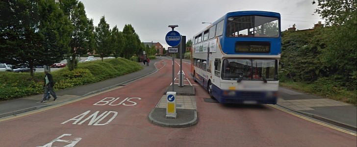 The lane is clearly marked for bus use online