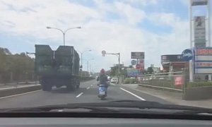 Drunk Man Riding a Moped Is Natural Selection at Its Best