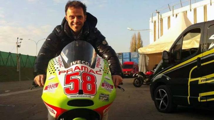 Loris Capirossi, beaming with joy over his Ducati MotoGP machine