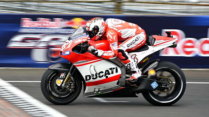 Ducati MotoGP bike passing the finish line at Indianapolis, 2014