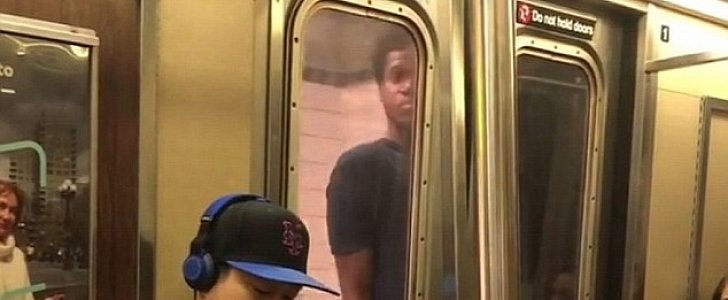 Subway surfer caught riding on the side of the train in NYC