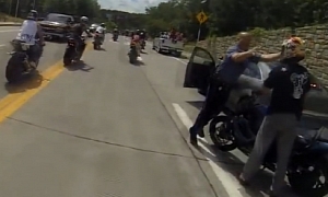 Dumb Rider Crashes a Wheelie into Police Car