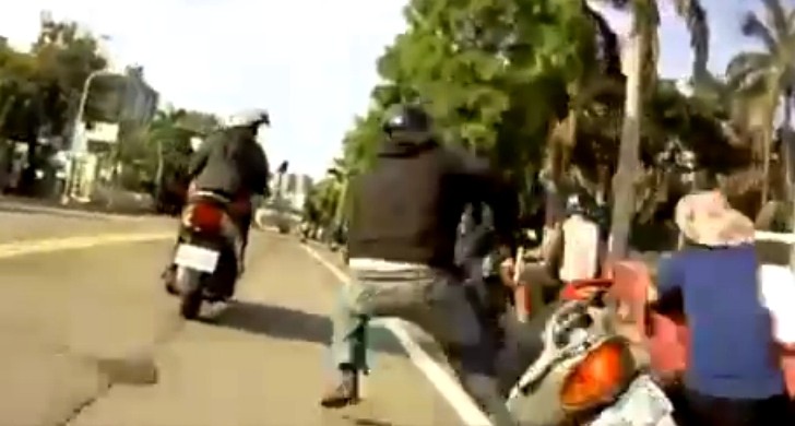 Dumb Scooter Rider Crashes into an Unsuspecting Cyclist