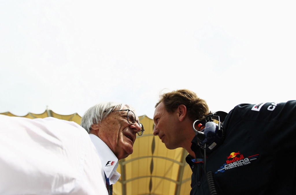 Ecclestone talks to Christian Horner on the F1 grid in Malaysia