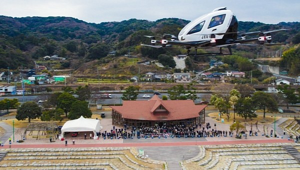 The EH12 carried passengers flying in autonomous mode over a coastline in Japan