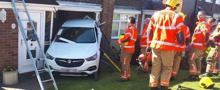 Elderly driver crashes Vauxhall into neighbor's home while reversing