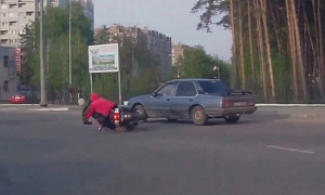 Elderly Russian Scooter Rider Spills