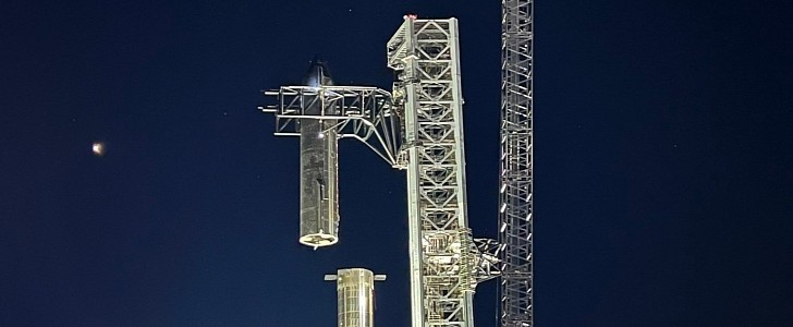Mechazilla Chopsticks holding Starship prototype in the air