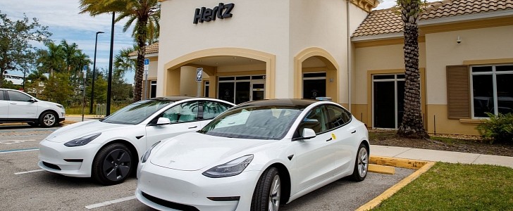 Tesla Model 3 in front of Hertz office