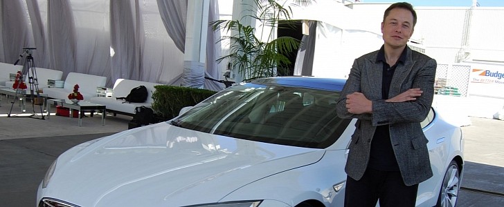 Elon Musk Next to an Older Tesla Model S