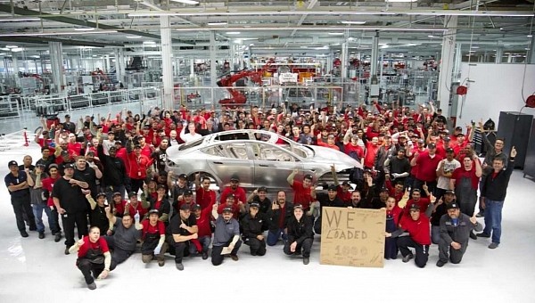 Tesla employees celebrating production milestone in Fremont, California