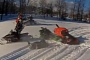 Extremely Stupid Snowmobile Accident Causes Broken Bones