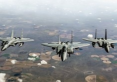 F-15 Eagles Come Together in the Sky to Feed, Those Are Not Crop Circles in the Background