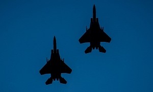 F-15E Strike Eagles Imprint Their Predator Forms on the Blue American Sky