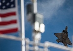 F-22 Raptor Flies Over Arizona, Stars and Stripes Stand Proud